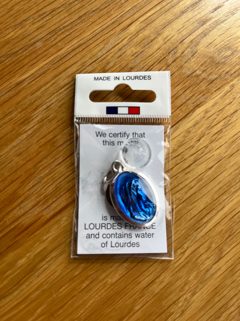 Lourdes Medal with water from the springs at Lourdes, Deep Blue Oval Medal that is 1 & 1/4 inches long