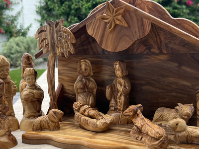 Olive Wood Musical Nativity Set from the Holy Land - all figures hand carved from Olive Wood in Bethlehem - Star turns clockwise to play a Chrismas carol